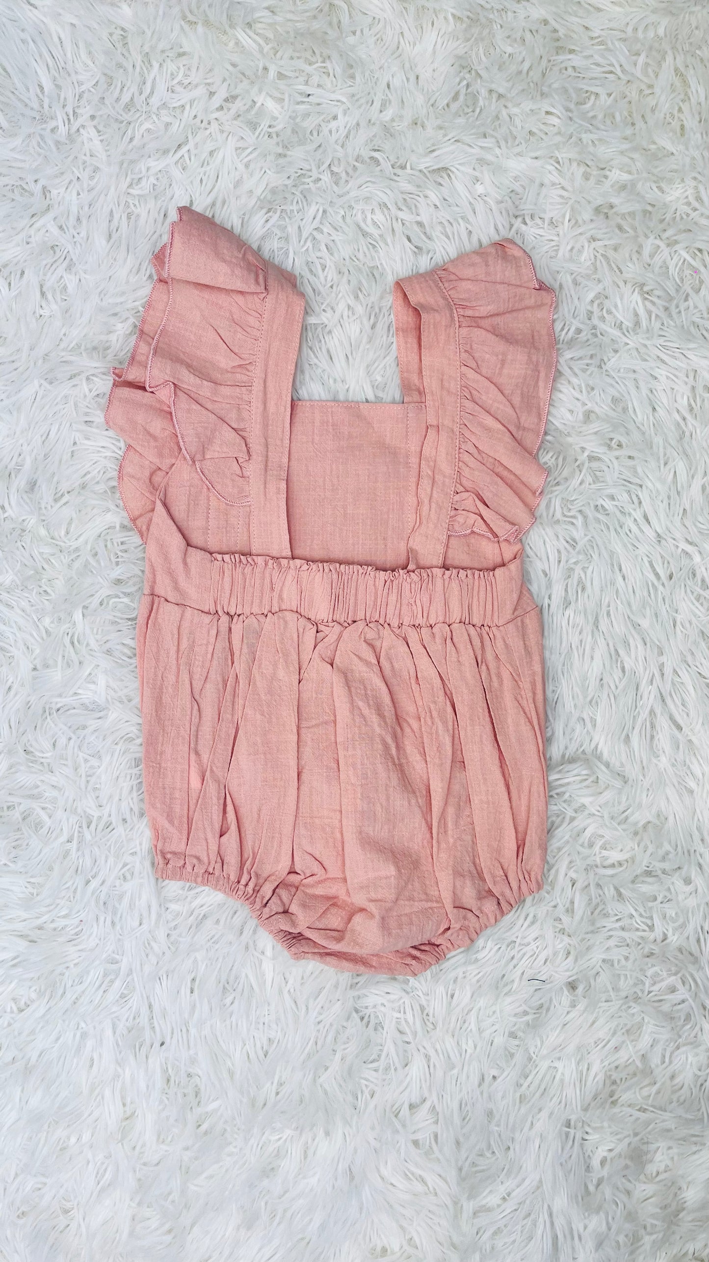 Mono rosa de Importación 9 meses
